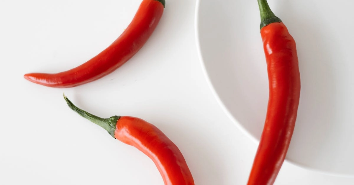 Интерфейс слота Chilli Heat Megaways с барабанами и символами